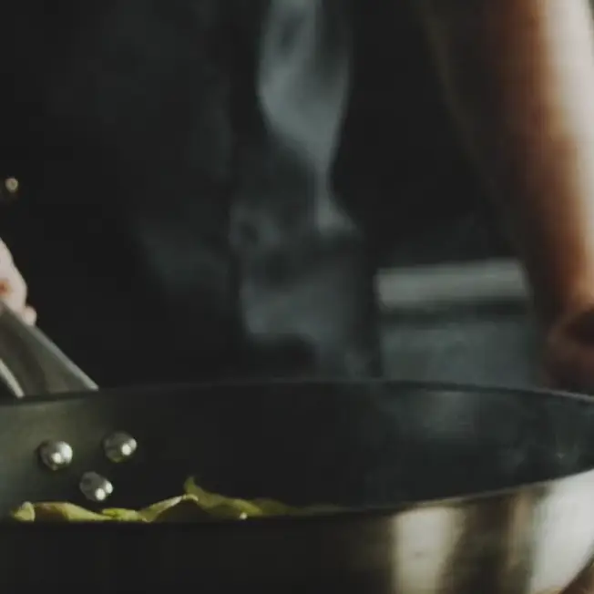 Greens cooking in a pan